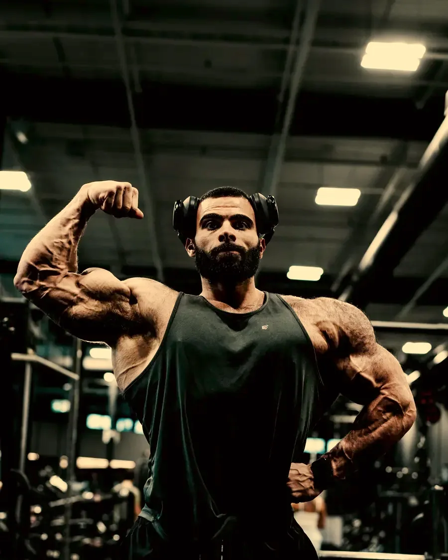 Justin flexing his biceps